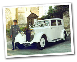1934 vintage Rolls Royce wedding car in white